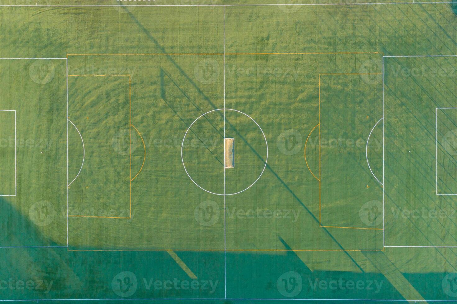 artificial grass soccer field seen from a drone, zenithal view photo