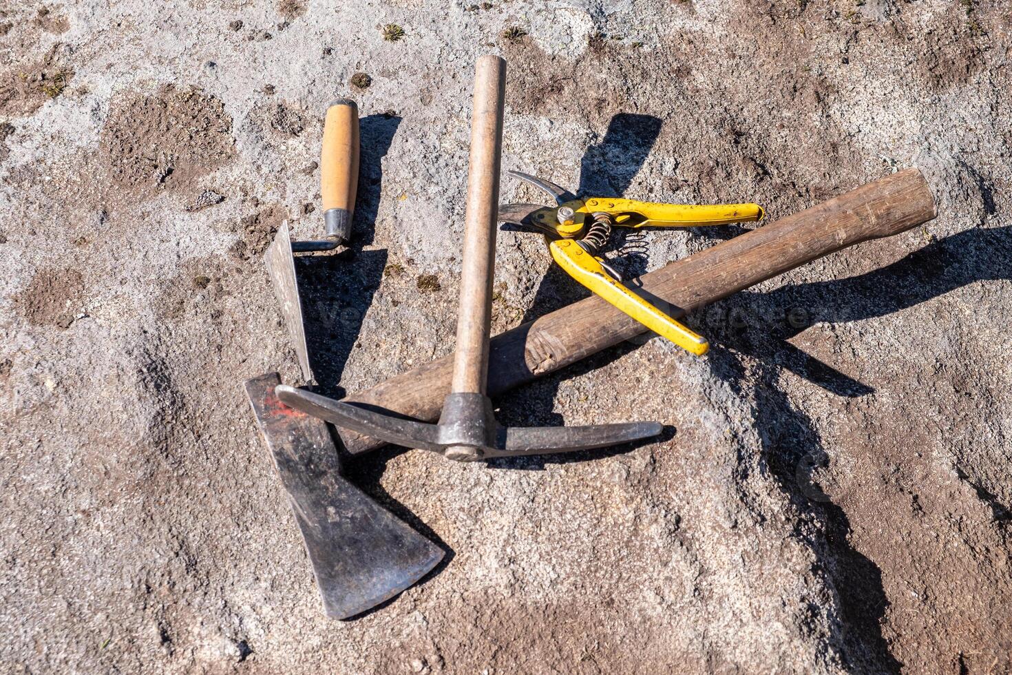 various working tools in an archaeological excavation photo
