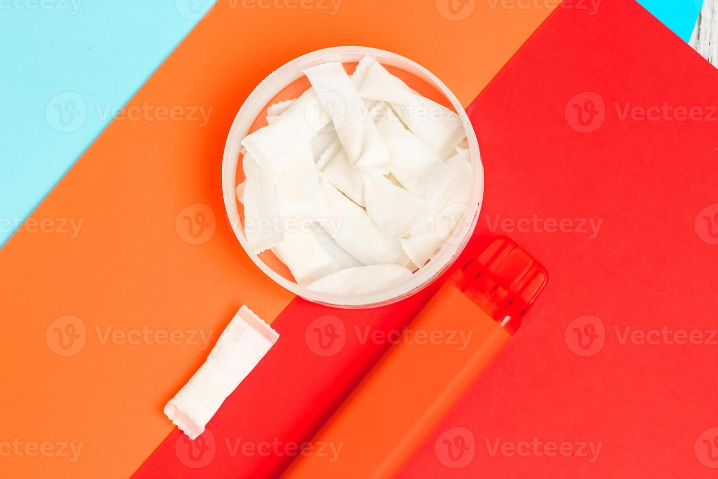 Nicotine pads snus, cigarette replacement, together with an electronic cigarette. photo