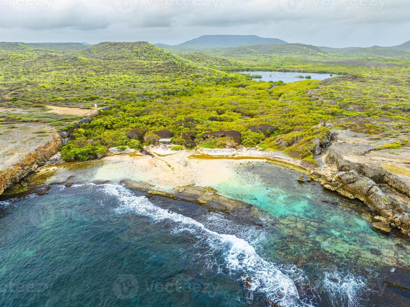 Aerial view over a blooming Caribbean island photo