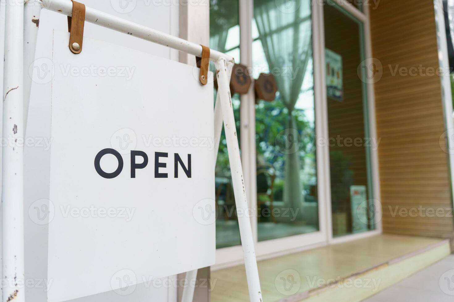 Open sign board. Board or start of opening Welcome entrance of Small business cafe or restaurant and advertising with open sign photo