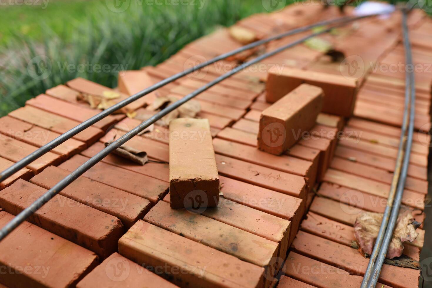 Pallet a red brick building material stack of new red bricks for construction. photo