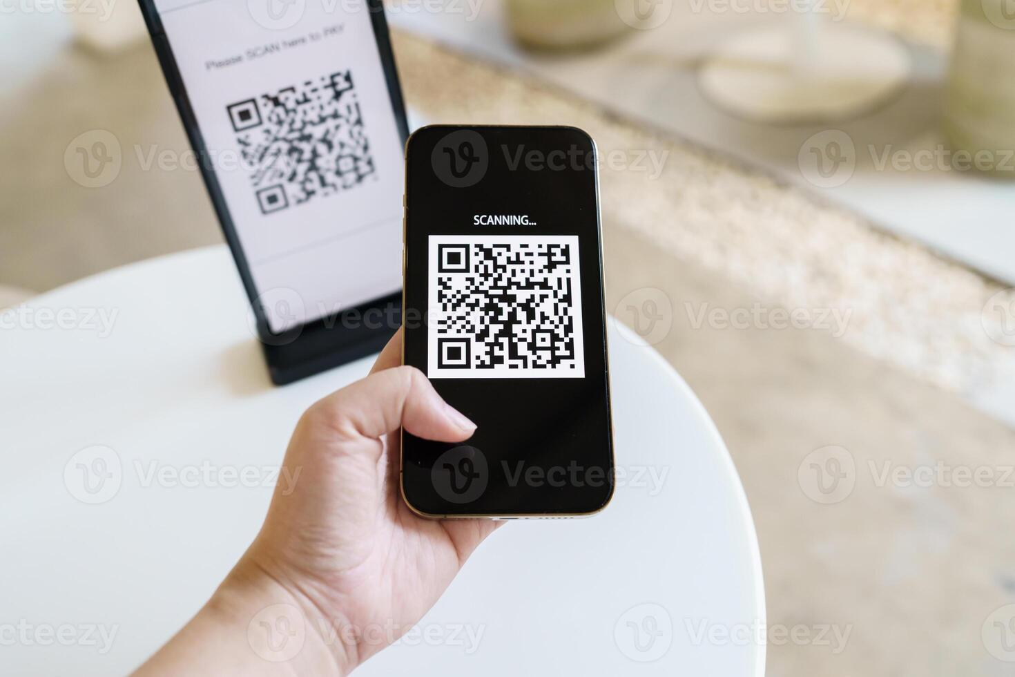 Qr code payment. E wallet. Man scanning tag accepted generate digital pay without money.scanning QR code online shopping cashless payment and verification technology concept. photo