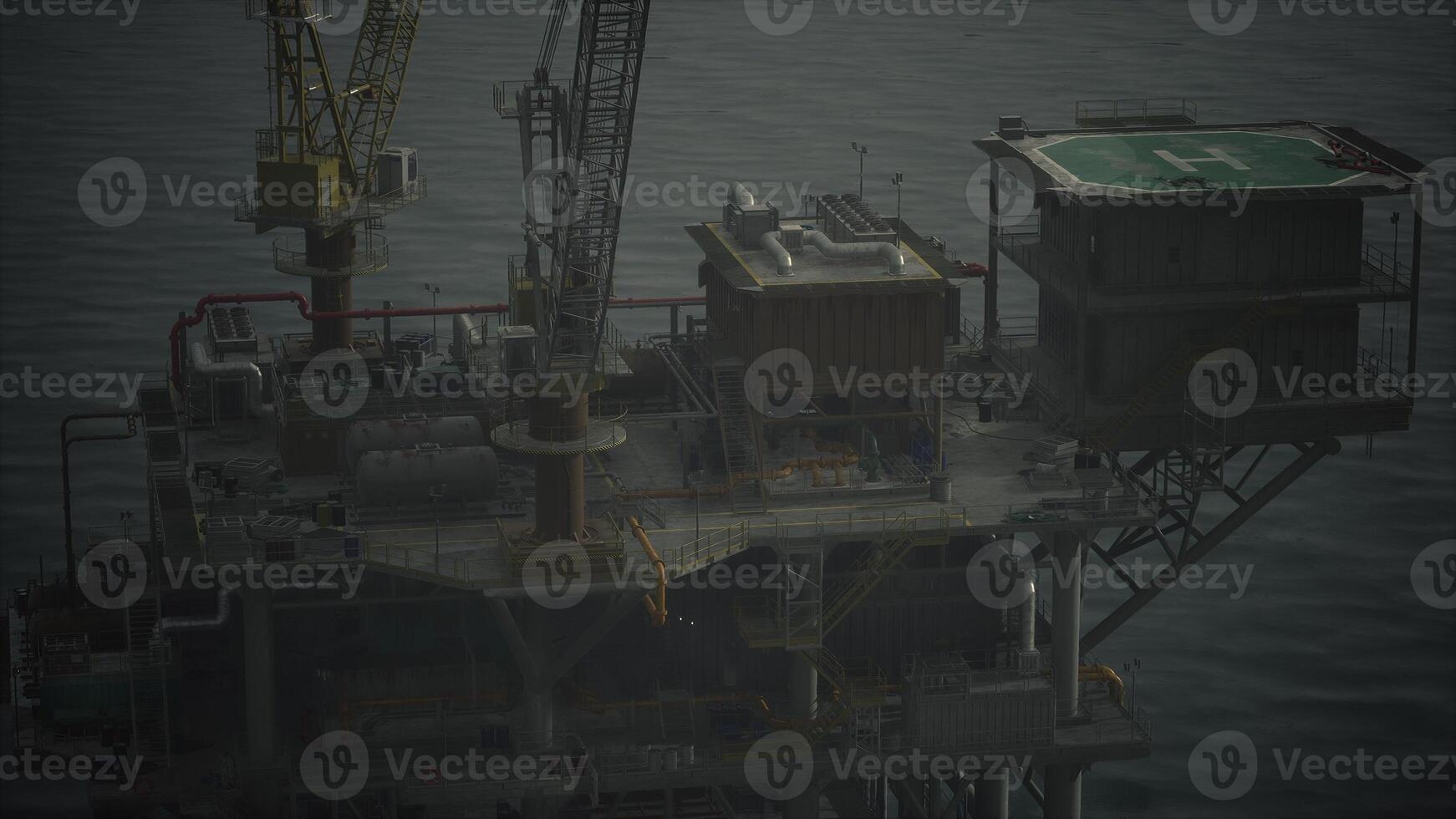 An oil rig in the middle of the ocean photo