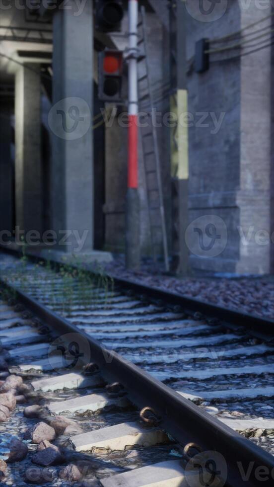 Old Abandoned Railway Track With Red Light photo