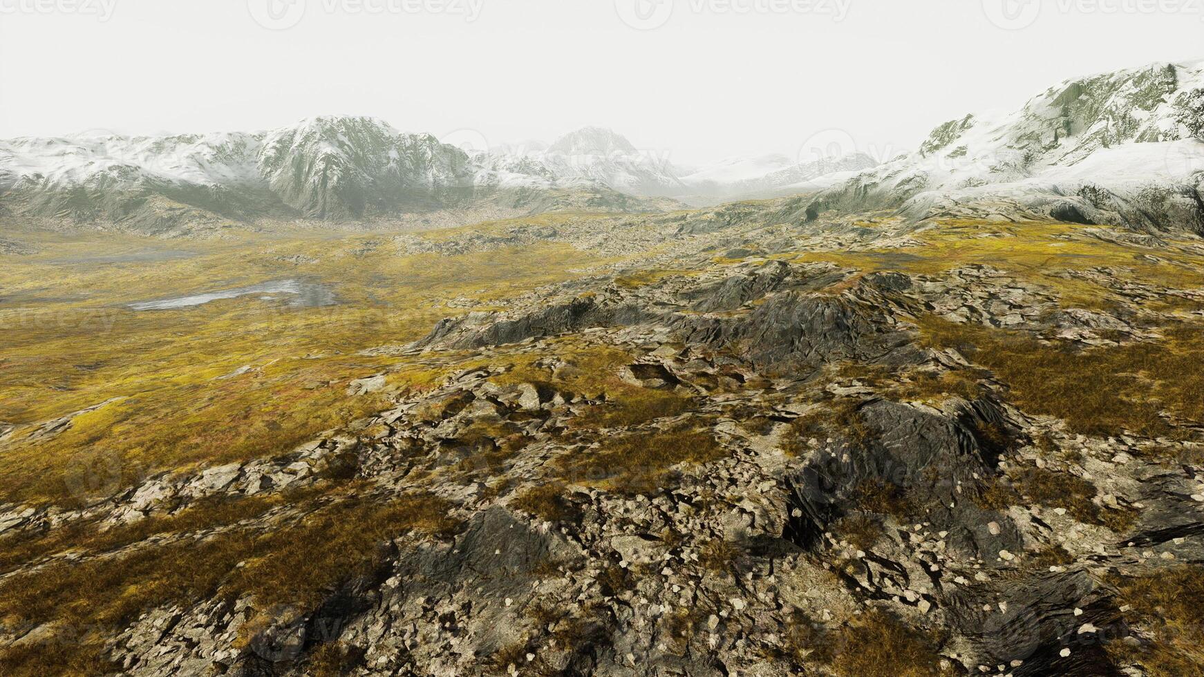 Aerial View of Snow-Covered Mountain Range photo