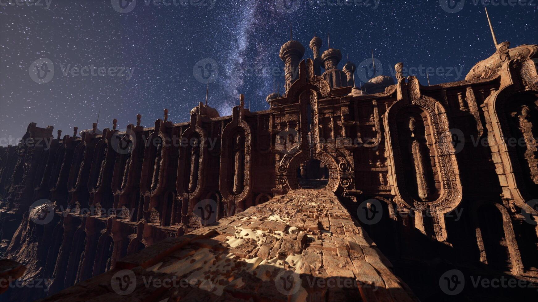 A very tall building with a sky full of stars in the background photo