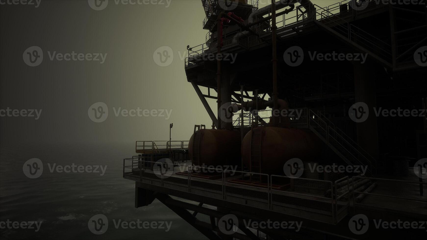 An oil rig in the misty depths of the ocean photo