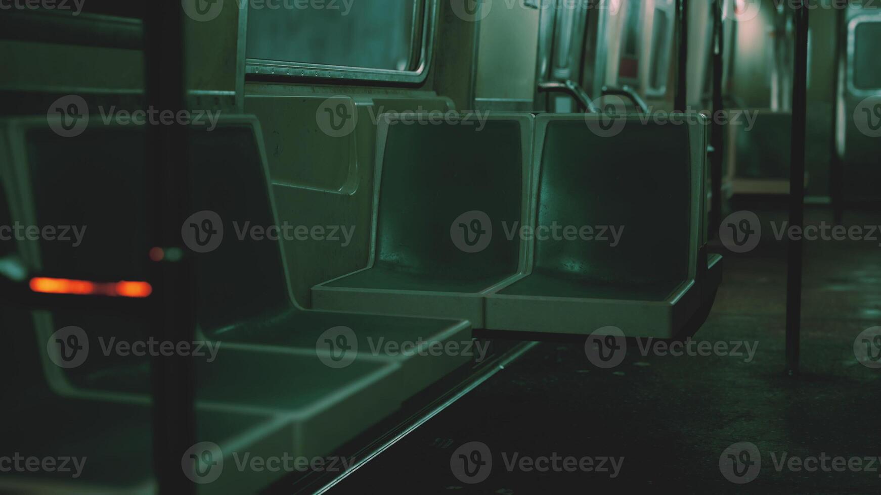 Empty Seats in a Subway Car photo
