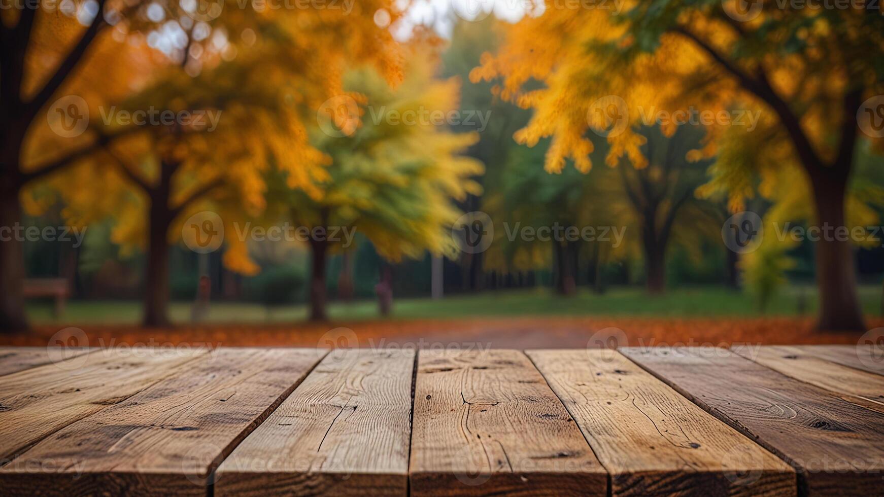 Empty wooden surface on blurred seasonal autumn background. Nature with view to park trees. Mock up with copy space. Template showcase scene for display, montage, advertising product. photo