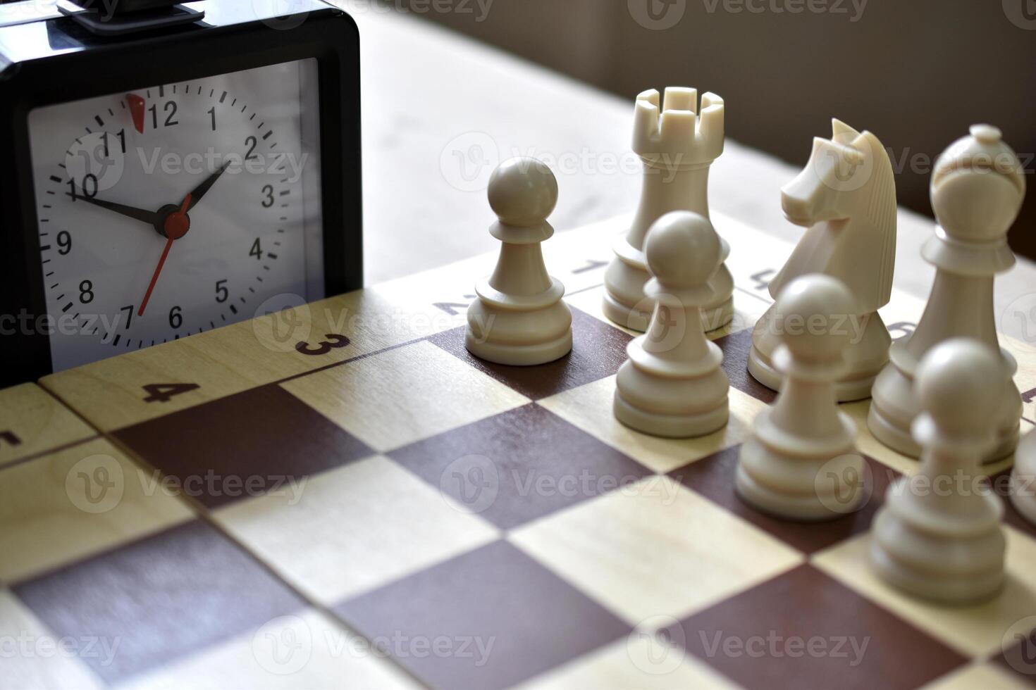 A chess board and a chess clock. Chess competitions. photo