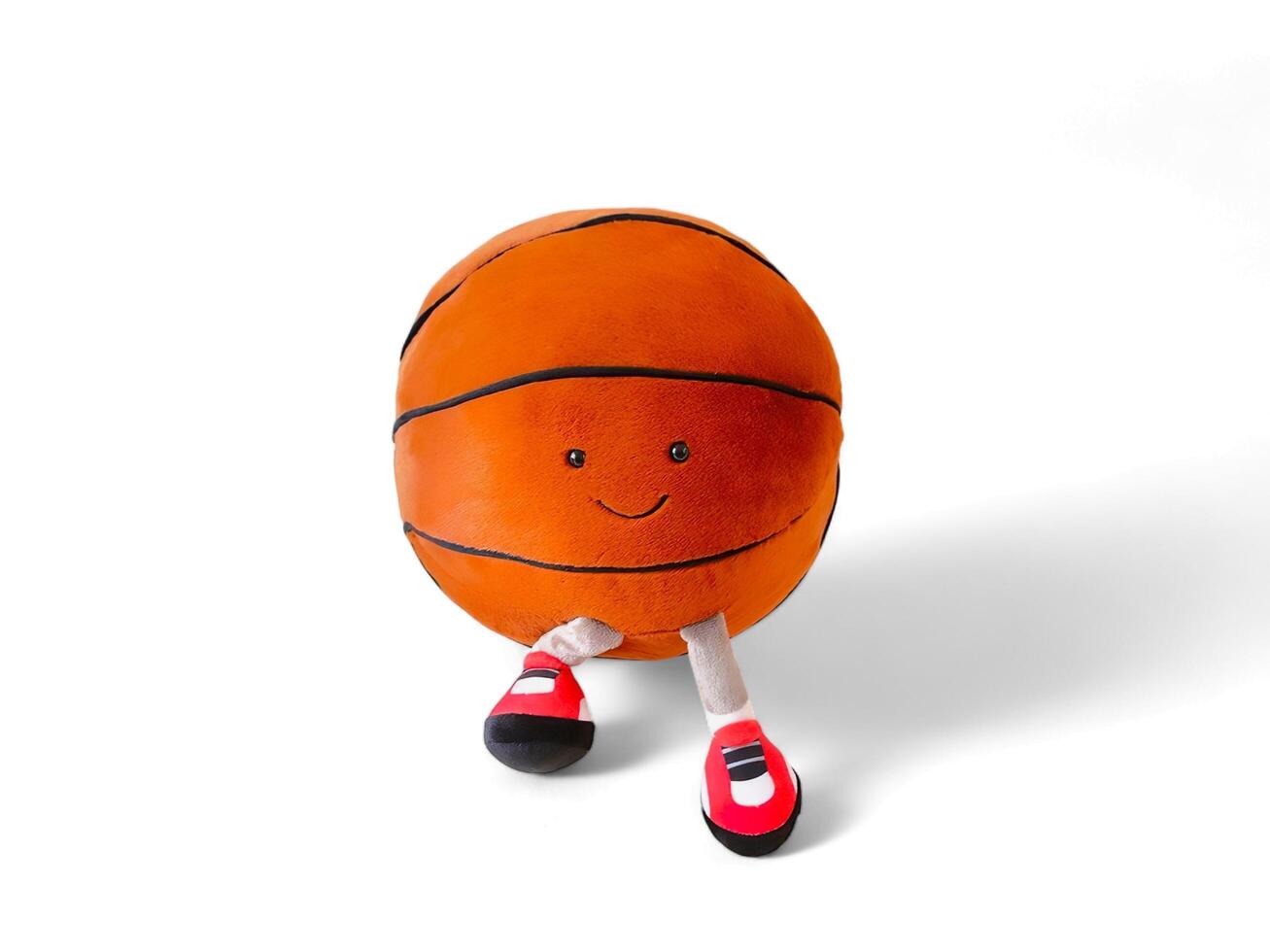 Basketball doll on white background photo