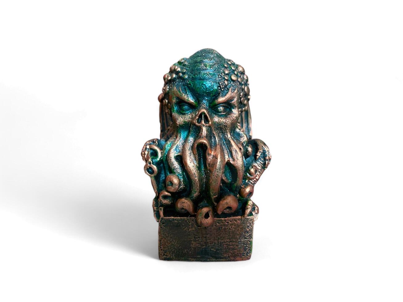 statue of a octopus head isolated on white photo