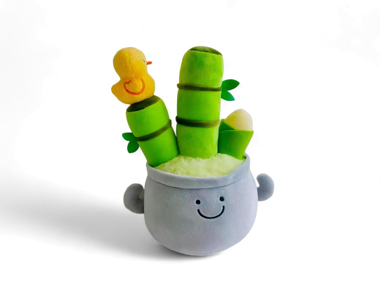 Stuffed bamboo tree in a pot on a white background photo