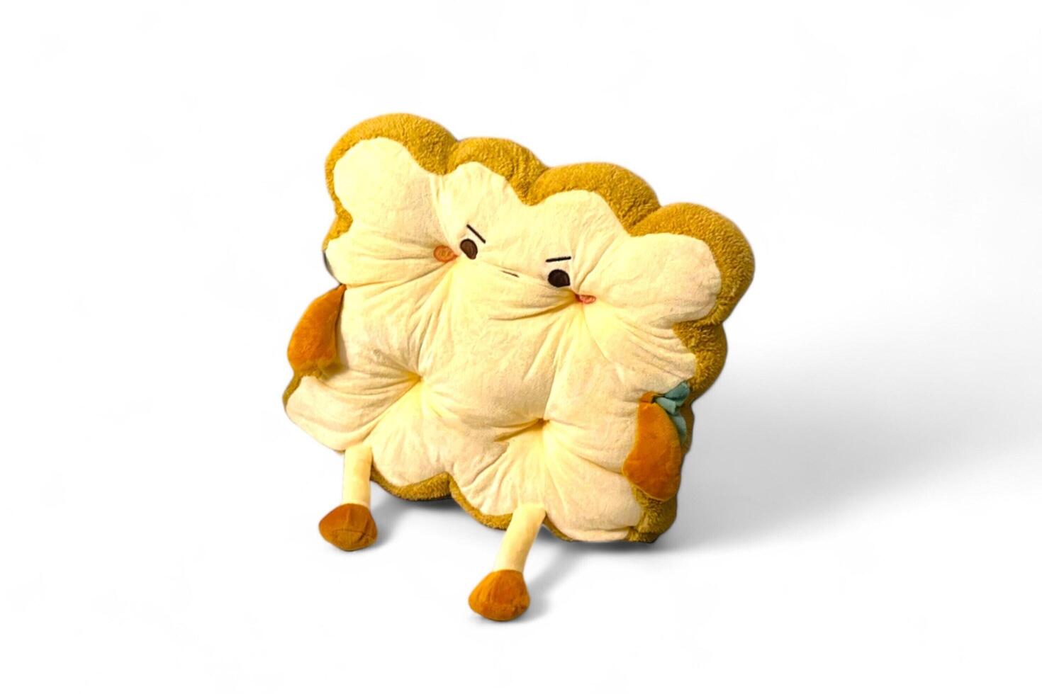 Cute doll of bread on white background photo