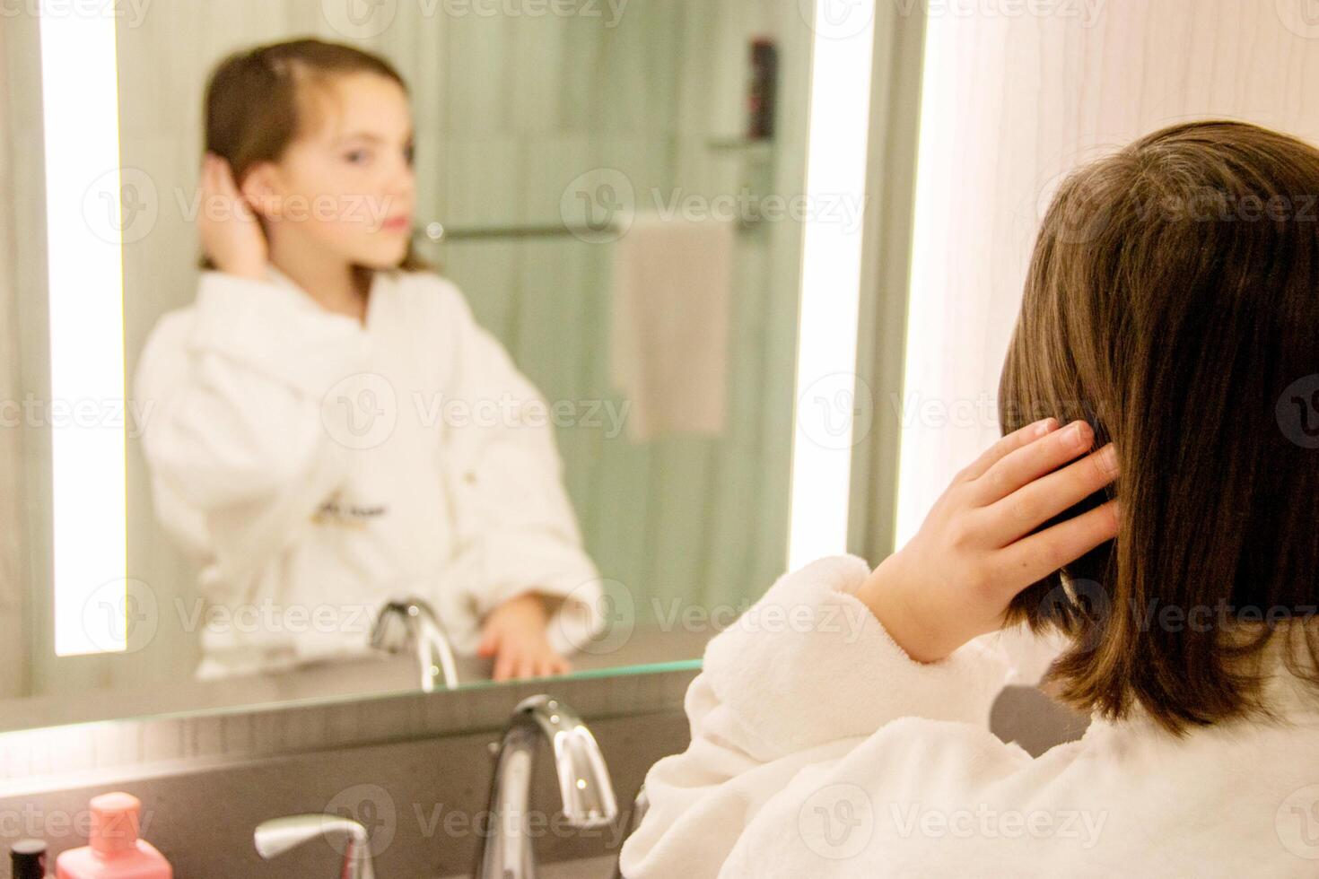 Beautiful girl sexy in a Bathrobe posing in the interior of the room photo
