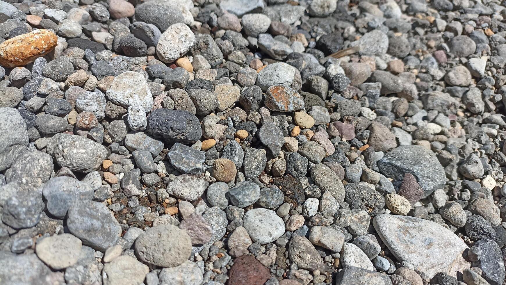 A collection of medium-sized stones is usually used as a mixture of building construction materials photo