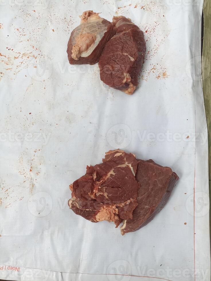 celebrating Eid al-Adha in Indonesia, several pieces of beef were distributed to local residents photo