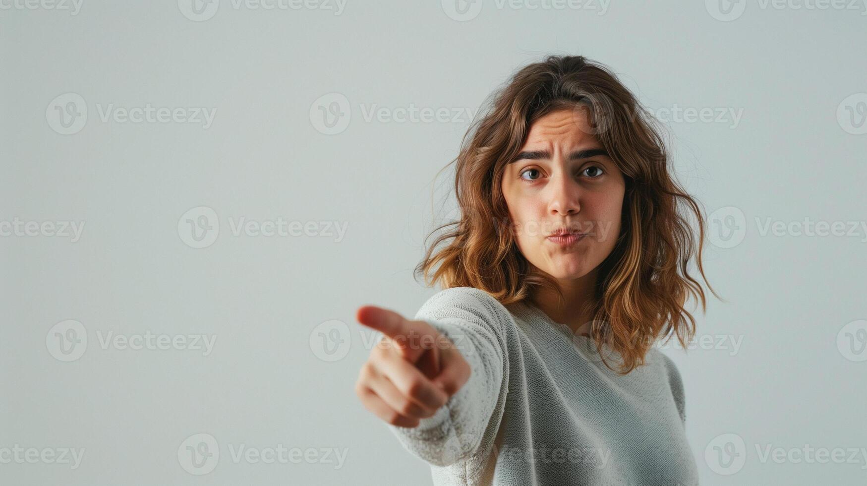Human smiling pointing at something isolated on white background photo