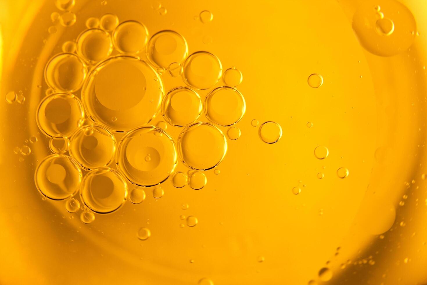 Cooking oil, cooking background, yellow oil drops and water kitchen. photo