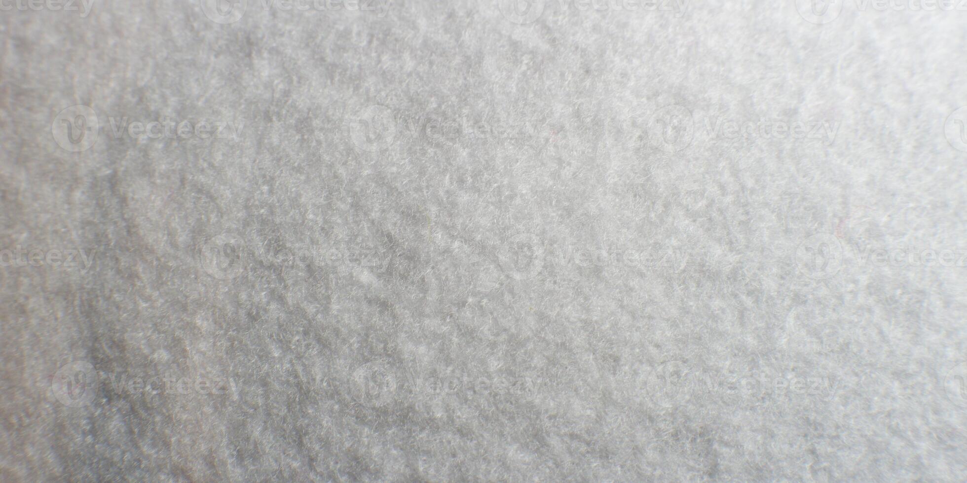 White artificial foam, foam texture on a light background. photo