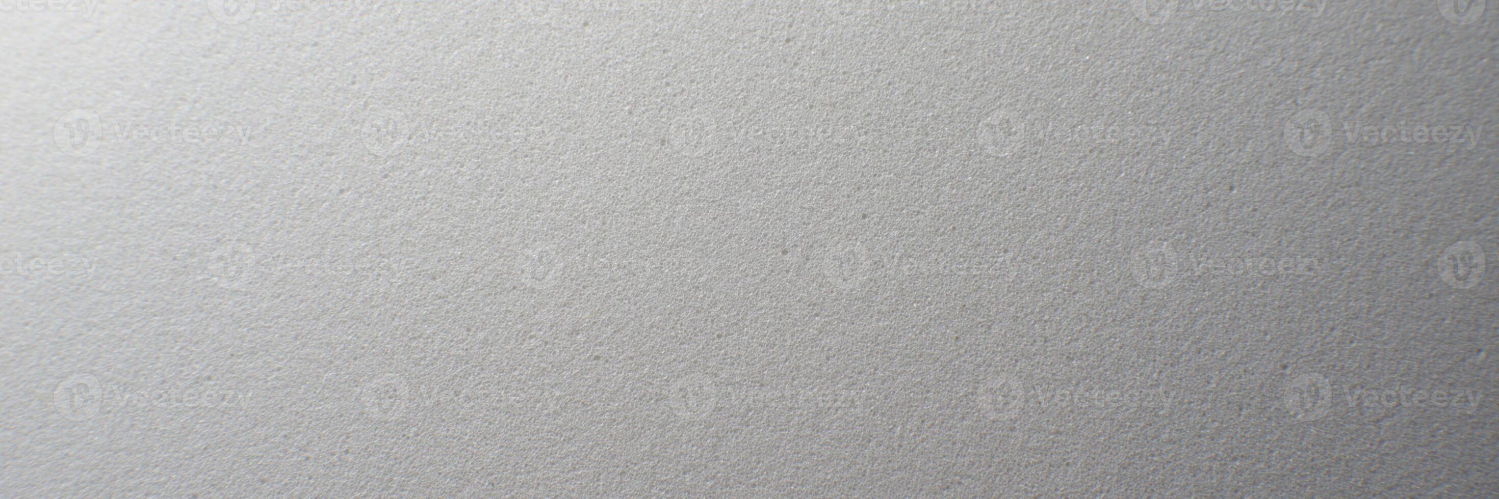 White artificial foam, foam texture on a light background. photo