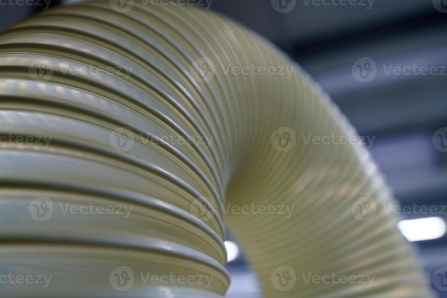 Flexible PUR antistatic suction hose for air conditioning, background flexi hose, industrial ventilation photo