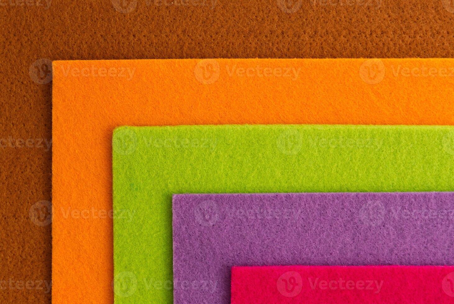 Colorful background pattern and texture of colored felt board. photo