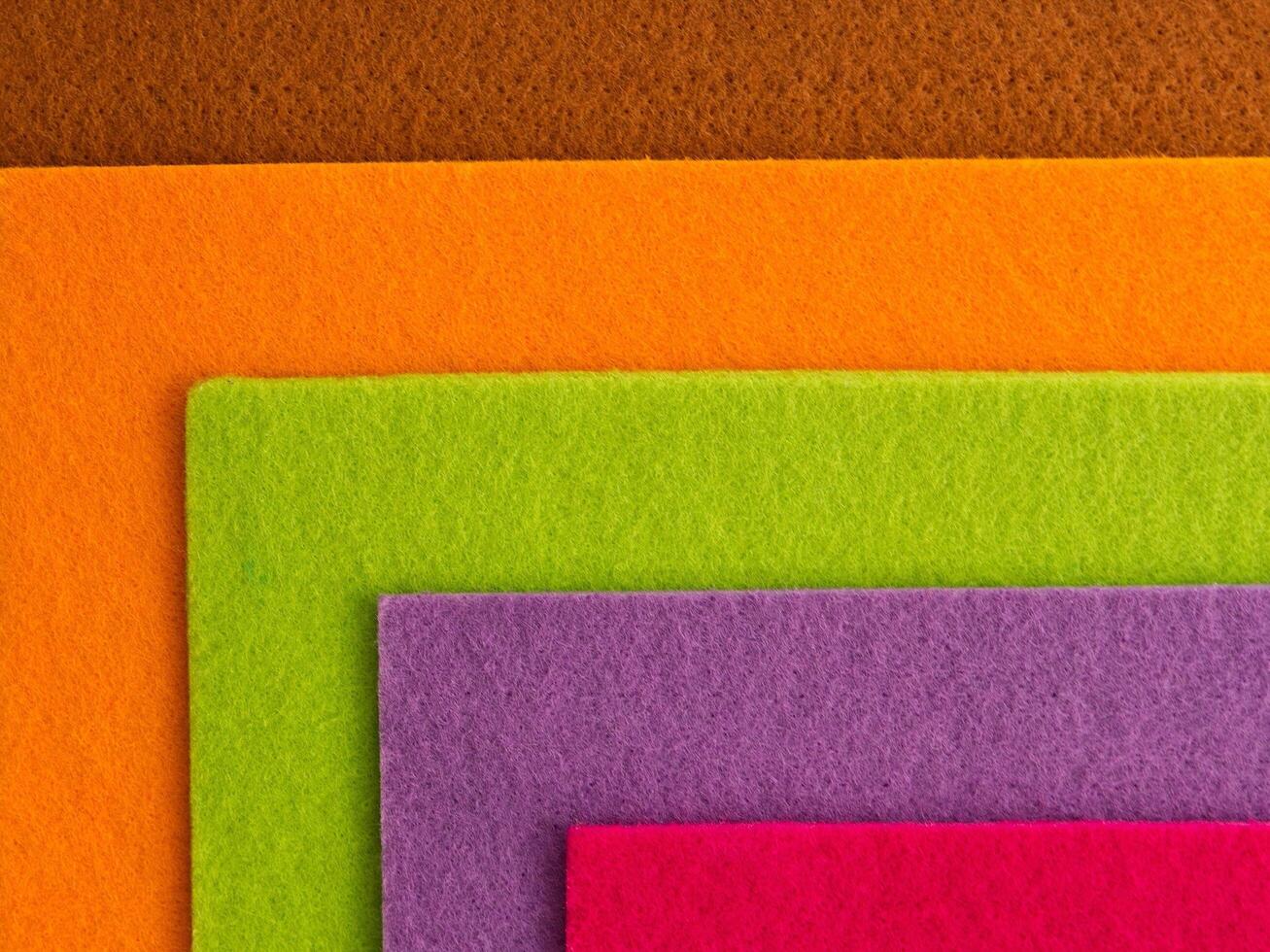 Colorful background pattern and texture of colored felt board. photo