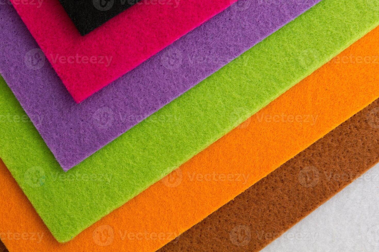 Colorful background pattern and texture of colored felt board. photo