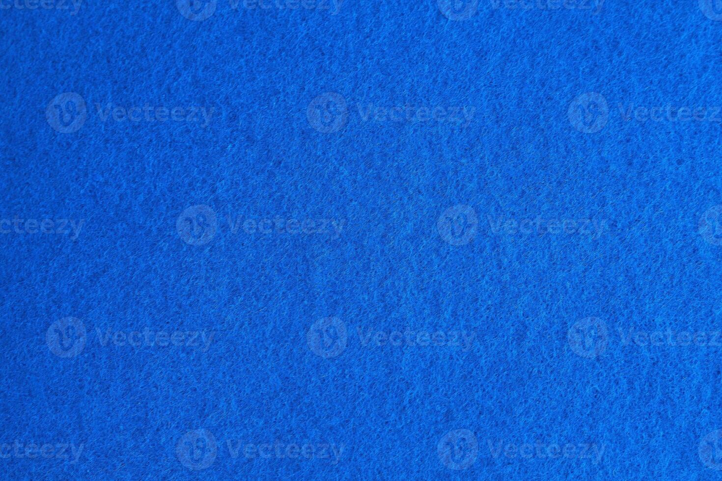 Purple and blue background pattern and texture of colored felt board. photo