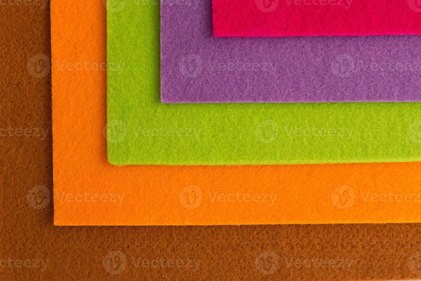 Colorful background pattern and texture of colored felt board. photo