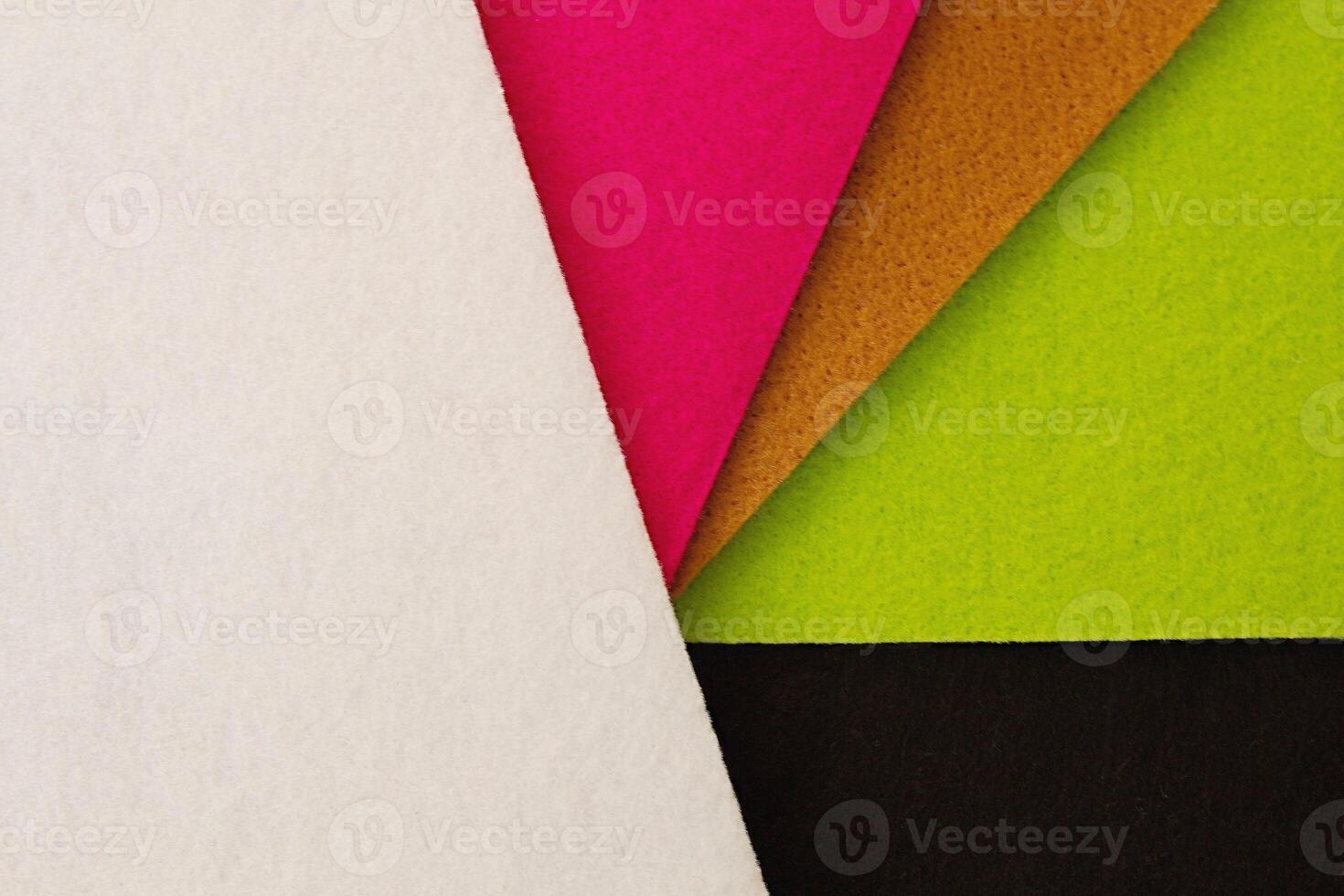Colorful background pattern and texture of colored felt board. photo