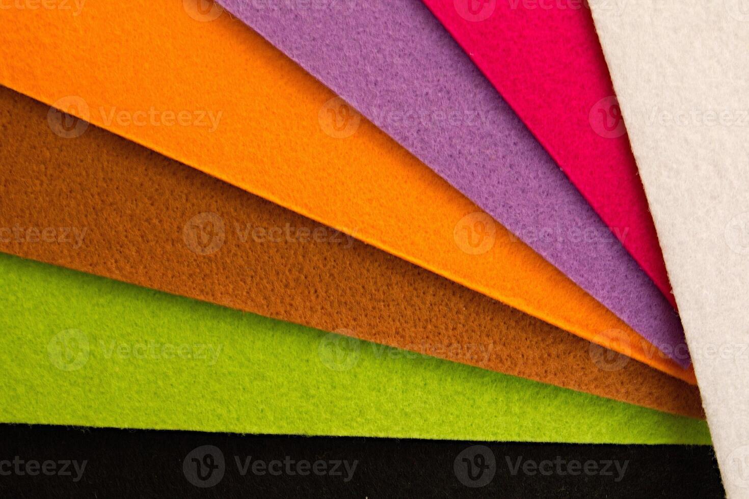 Colorful background pattern and texture of colored felt board. photo