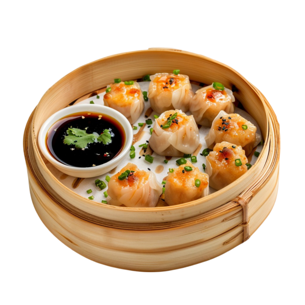 dumplings in a bamboo container with sauce png
