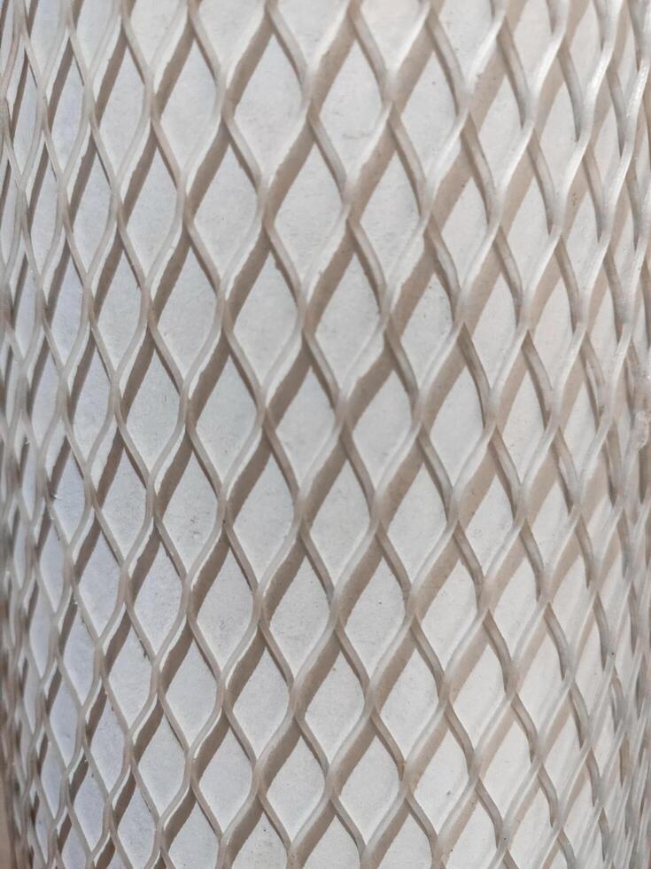 white oxygen cylinder protective cover net like texture or pattern photo