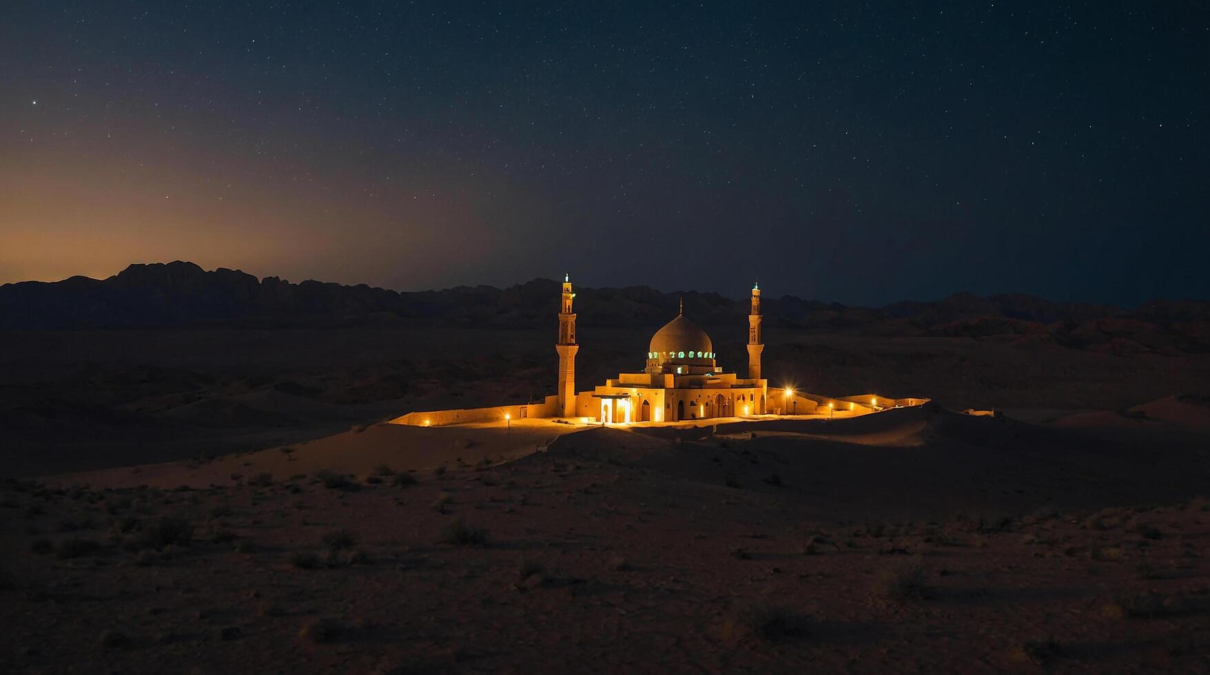 small mosque in the middle of the desert at night photo