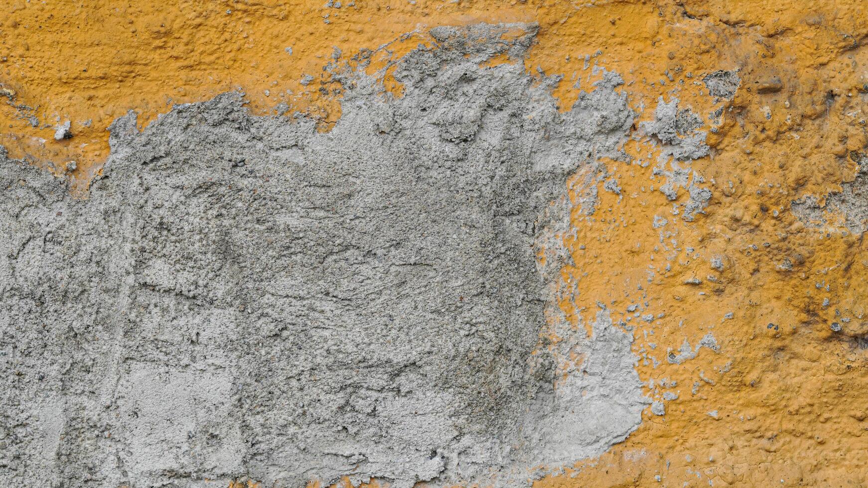 a close up of a wall with paint on it photo