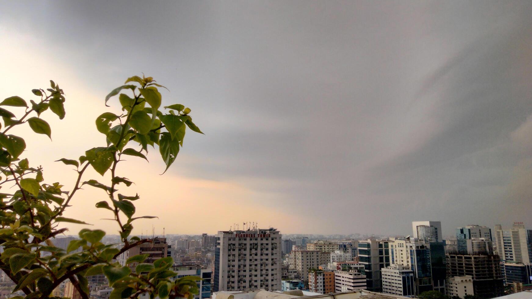 Beautiful view of field against cloudy sky photo