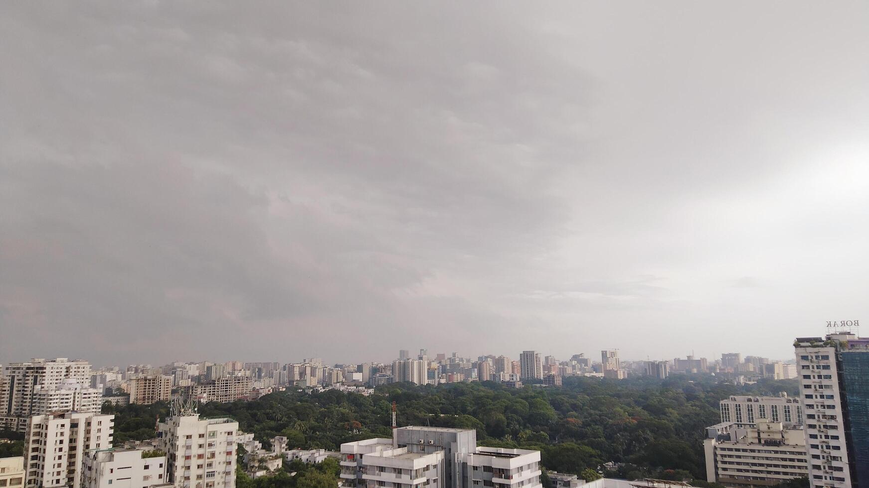 Beautiful view of field against cloudy sky photo