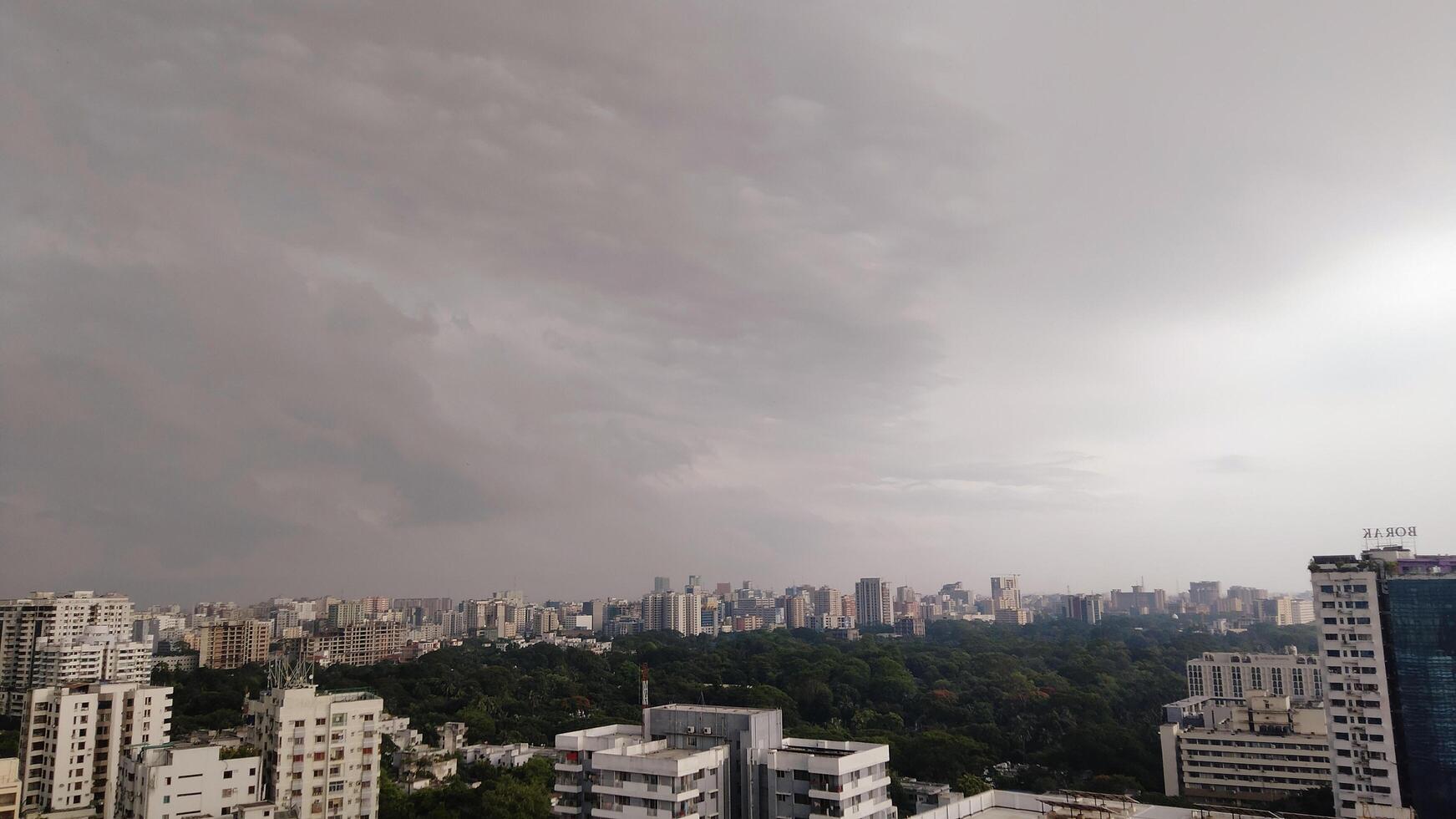 Beautiful view of field against cloudy sky photo