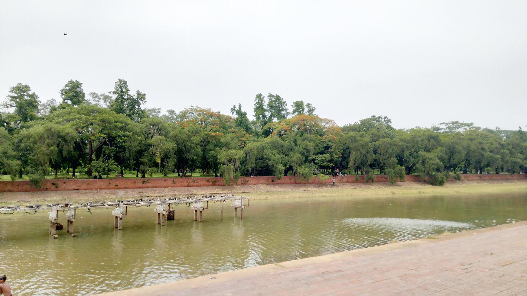 Beautiful the green scenery reflecting in the wonderful Lake photo