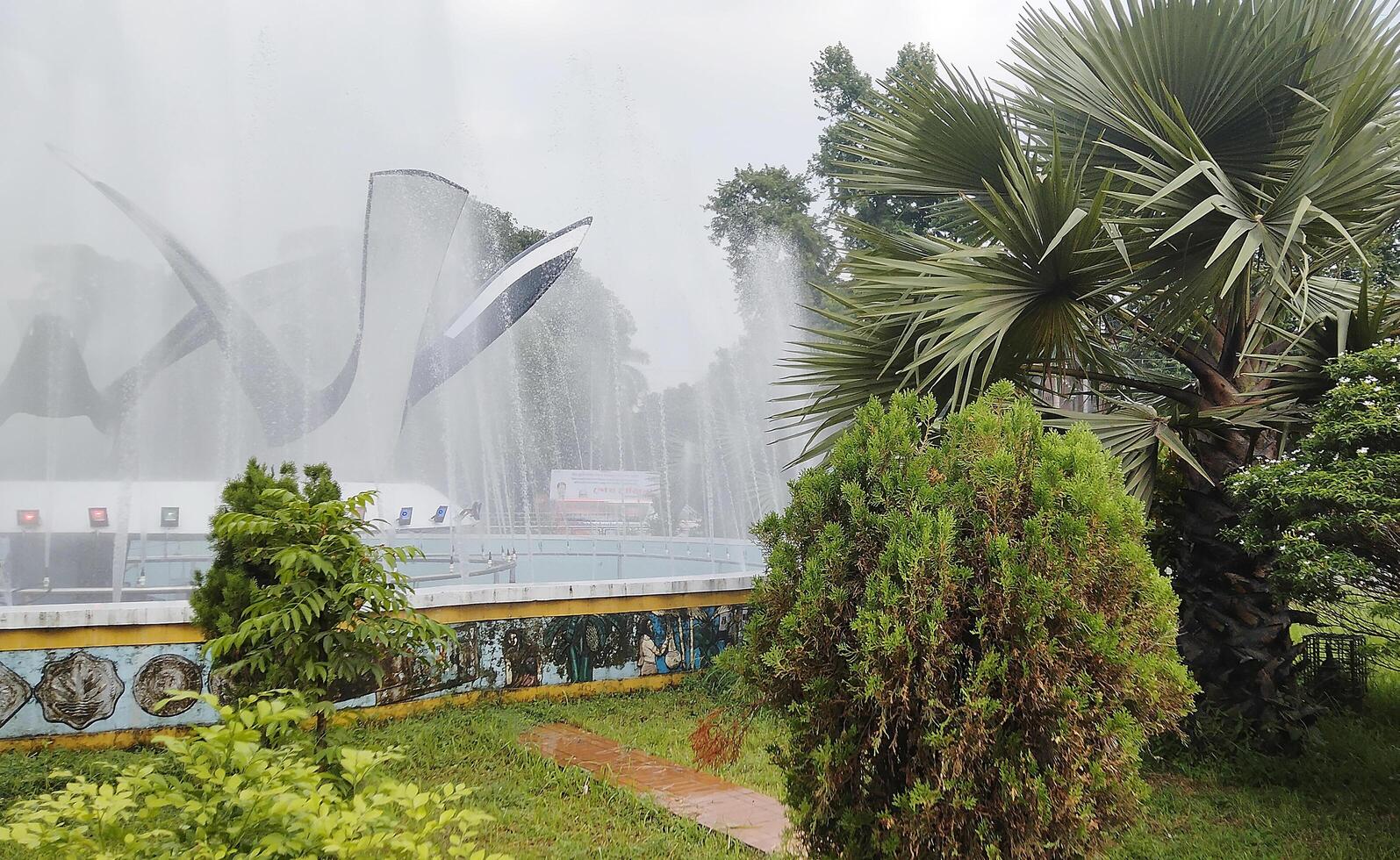 Splashing fountain in public park in City photo