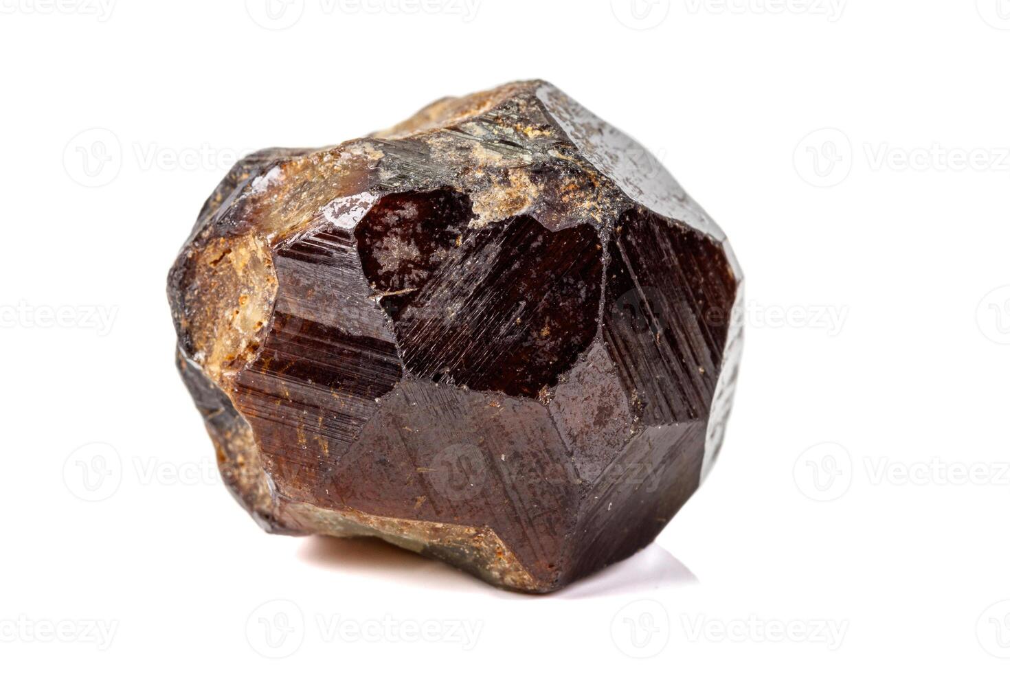 Macro stone Grossular mineral on white background photo