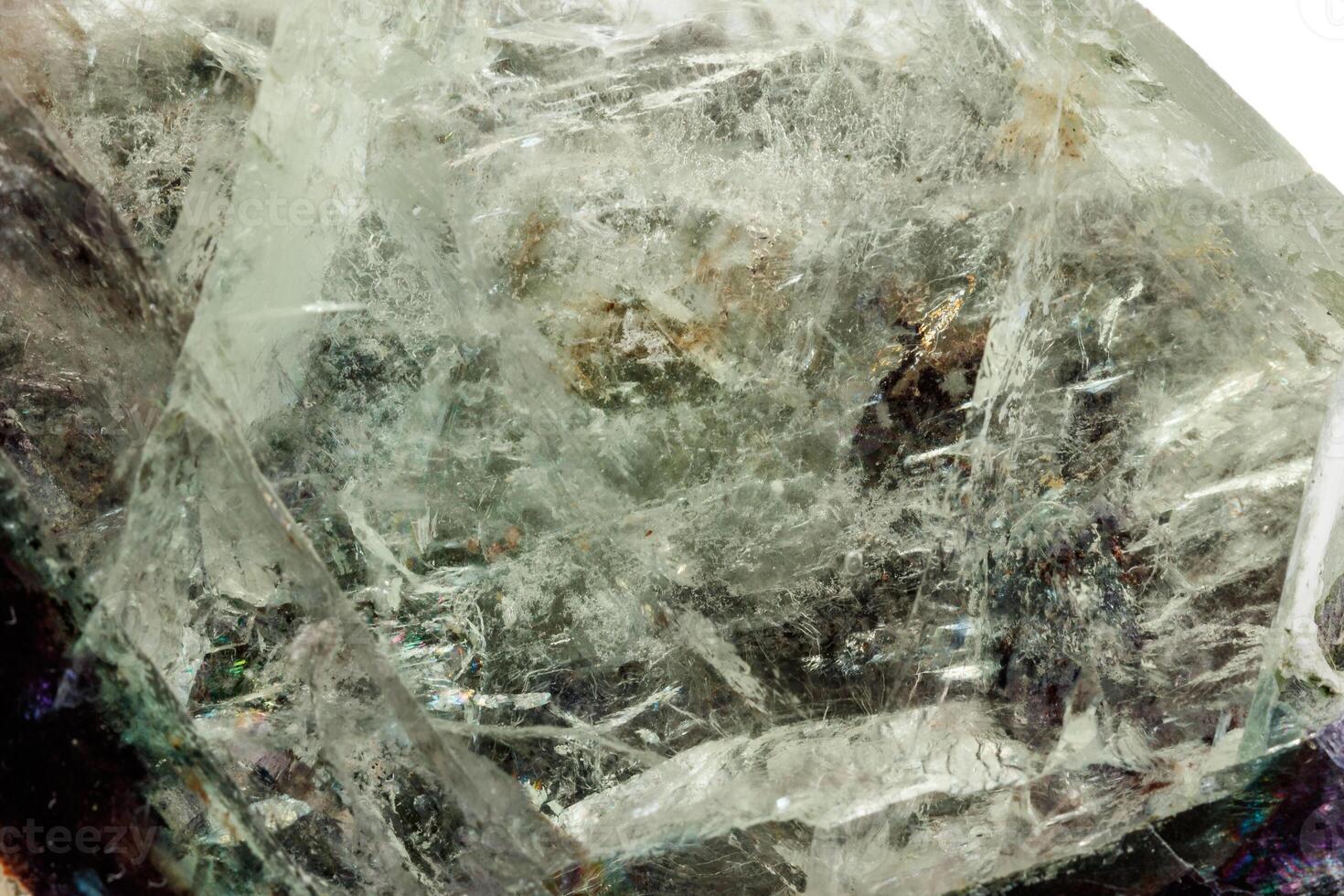 Macro of a mineral stone Fluorite on a white background photo