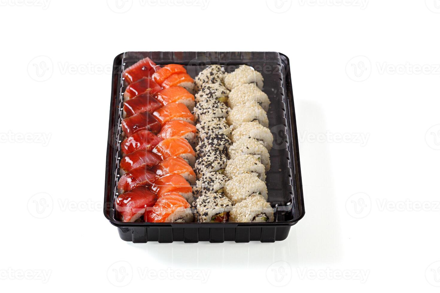 Sushi set in a delivery box on a white background photo