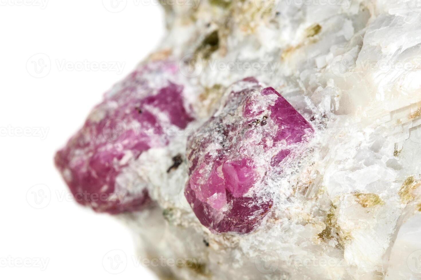 Macro mineral stone Ruby in rock on white background photo