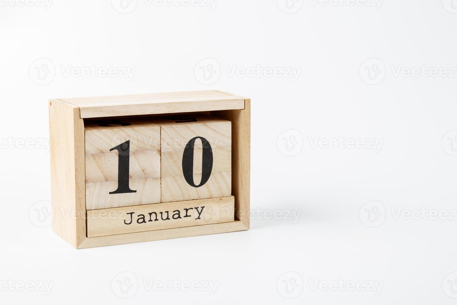 Wooden calendar January 10 on a white background photo