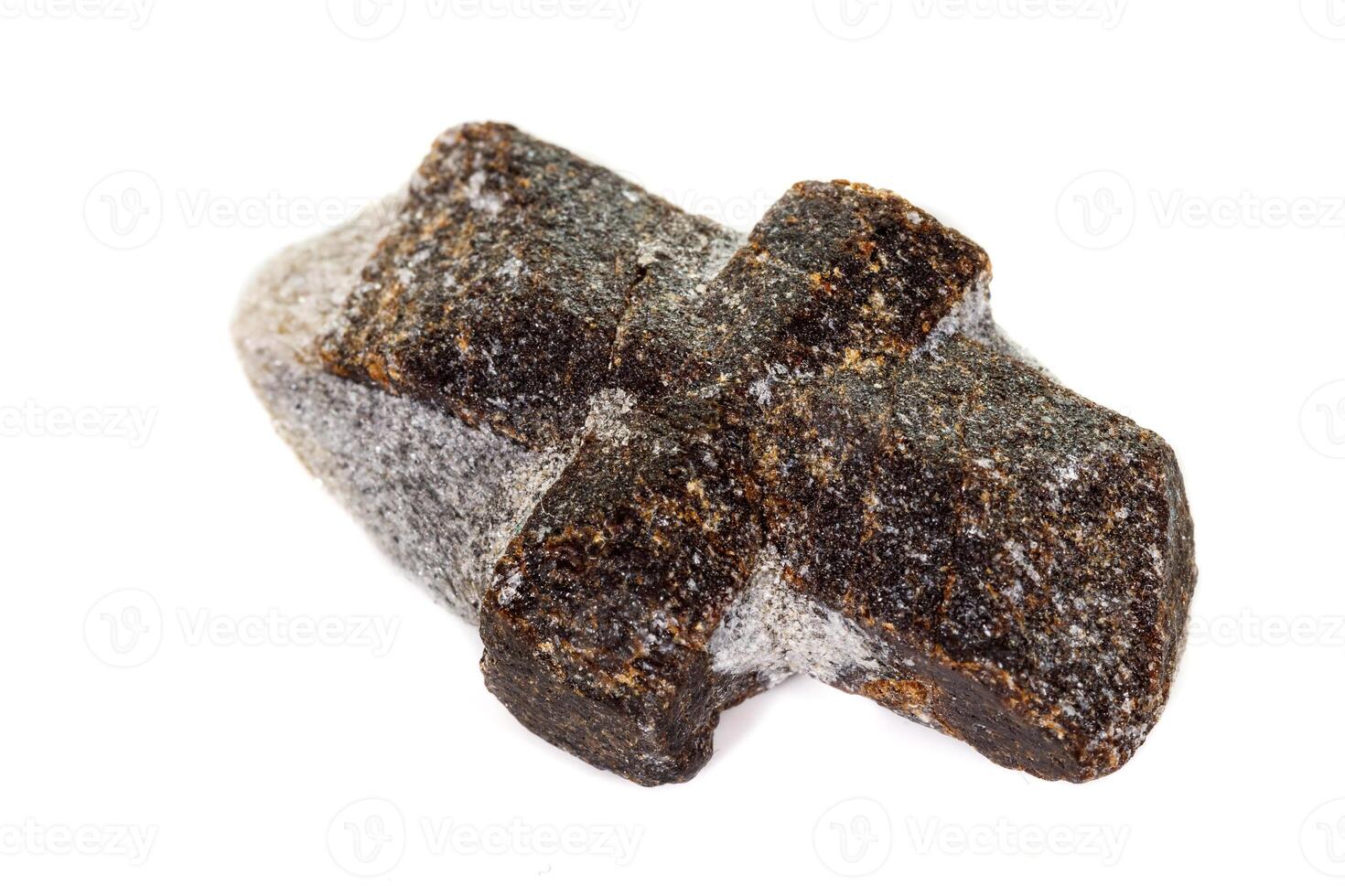 macro mineral stone Staurolite on a white background photo