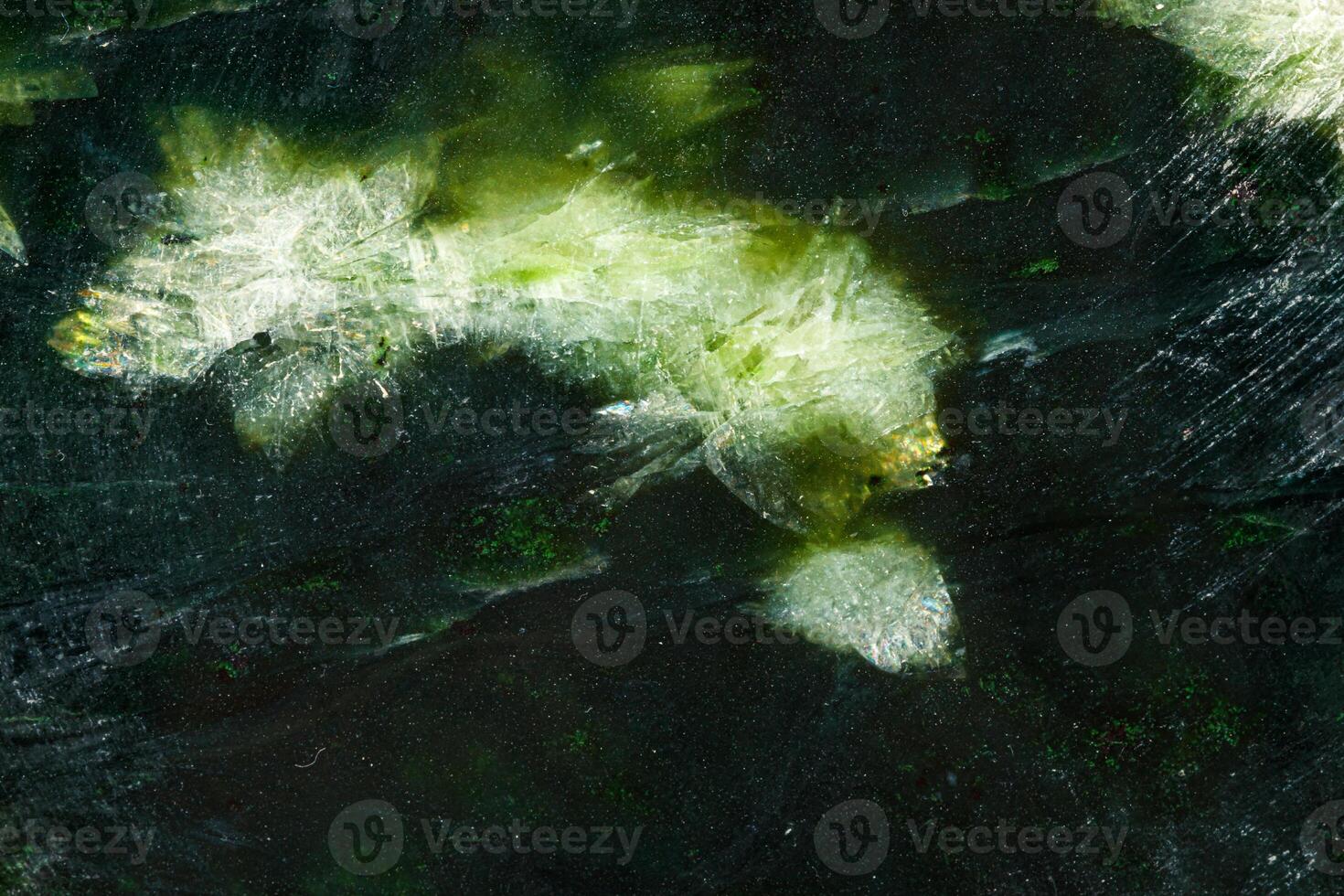 Macro stone Nephrite mineral on white background photo